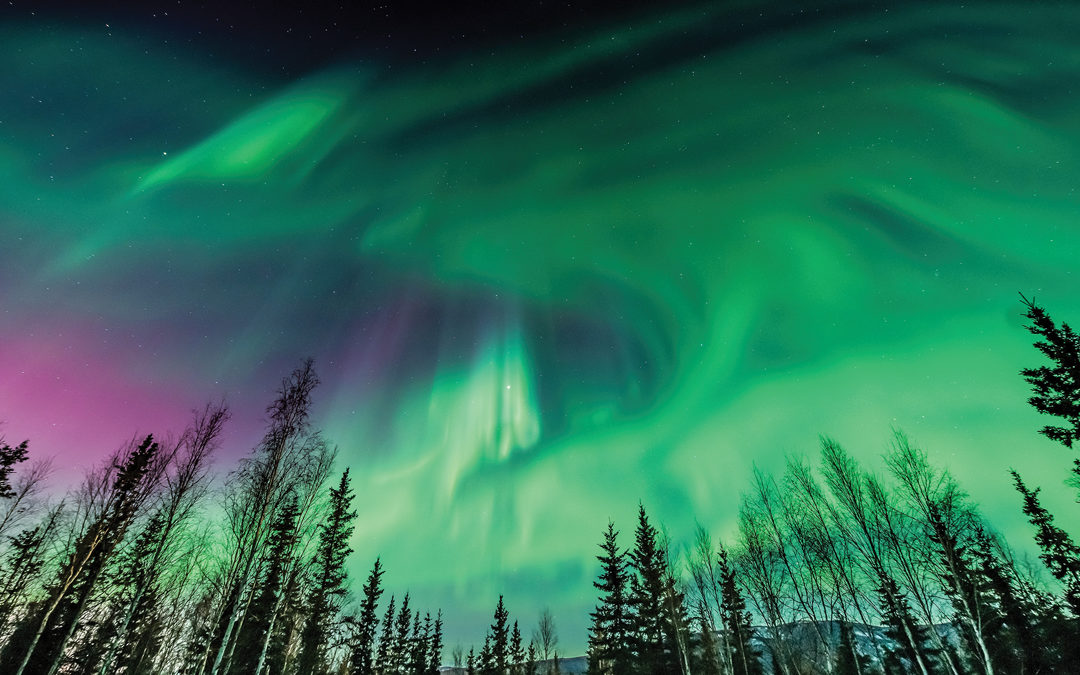 How to Chase the Northern Lights across the Arctic